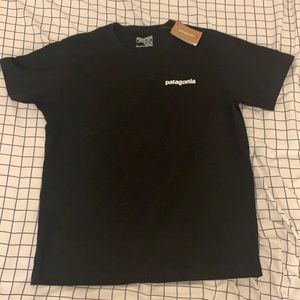 Black Patagonia mountains ocean mens shirt